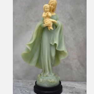 Old sculpture of Mary Madonna with child from Italy. CA, 200. Chalice co